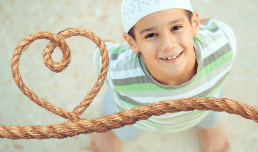 boy looking at heart rope